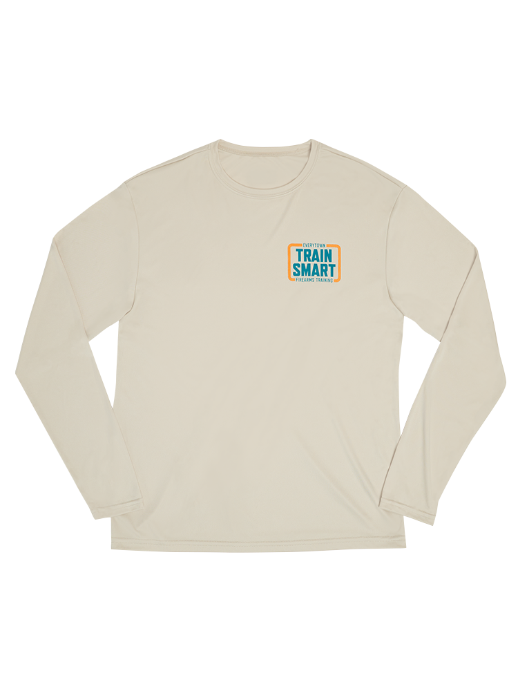 Front view of khaki-colored long sleeve unisex shirt with a teal and orange logo on left chest that reads: TRAIN SMART Everytown Firearms Training.